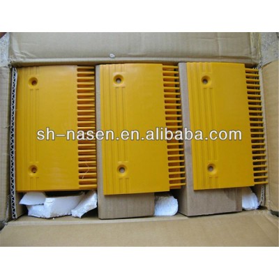 KONE escalator yellow plastic comb